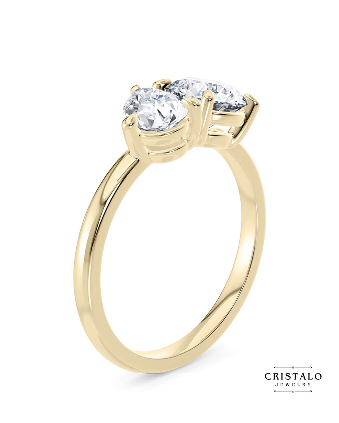 A beautiful Toi et Moi bracelet, symbolizing two souls united as one with a pear and a round diamond set on a yellow gold chain.