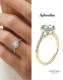 Aphrodite round cut diamond halo ring in 18k yellow gold. A WedFit engagement ring with a Castle setting and 4 claws.