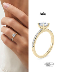 Aria oval cut diamond band ring in 18k yellow gold. A WedFit engagement ring with a total diamond weight of 0.19ct.