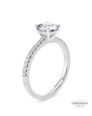Diamond band engagement ring with a Castle setting in 18k white gold. The ring features 4 claws and is WedFit.
