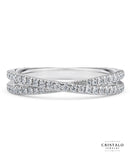 A classic claw-set ring in 18k white gold. The 3.50mm band is adorned with natural diamonds in a Castle setting.