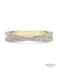 The Cassia Eternity ring with a Castle setting for added brilliance. This 18k yellow gold ring features two overlapping diamond bands with a total weight of approx. 0.25ct.