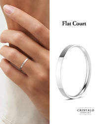 18k white gold modern wedding band with a sharp edge and a comfortable rounded inside.