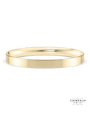 A 2mm Flat Court wedding band in 18k yellow gold. Features a modern flat outer surface and a rounded interior for comfort.