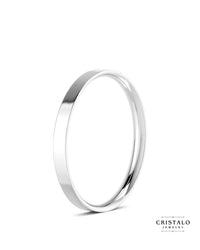 A perfect symbol of modern love: A white gold wedding band with a clean, sharp edge and a comfortable fit.