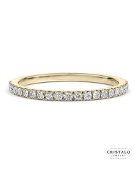 The Half Lab Grown Vogue eternity ring in 18k yellow gold. The 1.5mm band is claw-set with lab-grown round diamonds (G colour, VS clarity) for a total weight of 0.21ct.