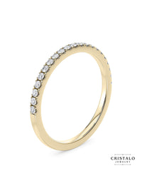 A subtle symbol of love: The Vogue ring with lab-grown diamonds, perfect to be worn alone or next to an engagement ring.