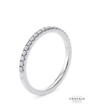 Claw set engagement ring in 18k white gold. Features natural diamonds with a Castle setting for added brilliance.
