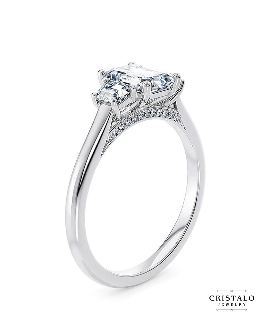A vintage-inspired Imperia Trilogy ring, showcasing the elegant display of rippled light from its step-cut emerald diamonds.
