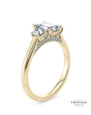 An elegant Imperia Trilogy ring, showcasing three striking emerald-cut diamonds on an 18k yellow gold band.