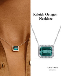 Elegant geometric pendant highlighting gemstone color and protective setting.