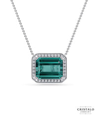 Kaleida Octagon necklace in 18k white gold with teal tourmaline and diamond halo.
