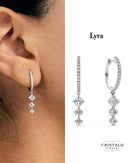 Lyra diamond drop earrings in 18k white gold. A classic piece with a total carat weight of 1.01ct and a Claw setting.