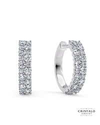 Find our signature Orion design replicated in a pair of brilliant hoops, offering mesmerising sparkle at every turn.