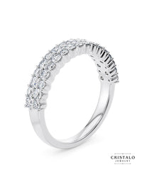 A beautiful Orion ring, capturing the delicate flicker of stars with alternating diamond sizes on a white gold band.