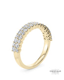 A beautiful Orion ring, capturing the delicate flicker of stars with alternating diamond sizes on a yellow gold band.
