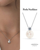 Elegant white gold pendant with subtle diamond sparkle, adjustable 16–18" chain.