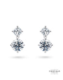 The Saros Natural diamond drop earrings in 18k white gold. This piece has a total diamond weight of approx. 0.70ct and a Claw setting.