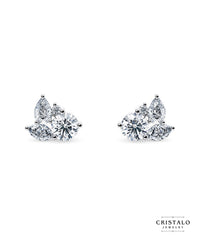 An elegant pair of Thalia cluster stud earrings, perfect for a glamorous finish and a mesmerising display of light.